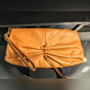 Hobo wristlet in tan leather